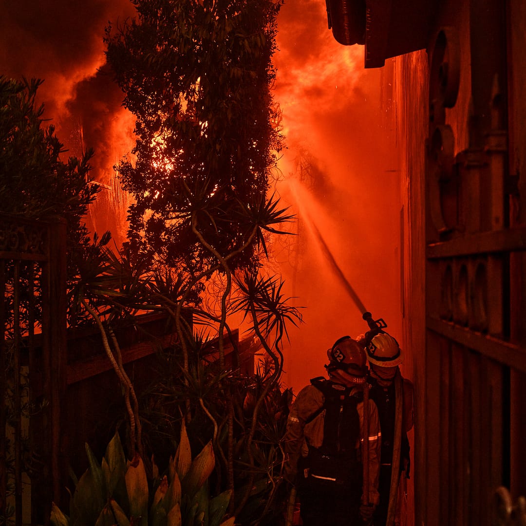 Wind-Fueled Fire Consumes a Los Angeles Neighborhood