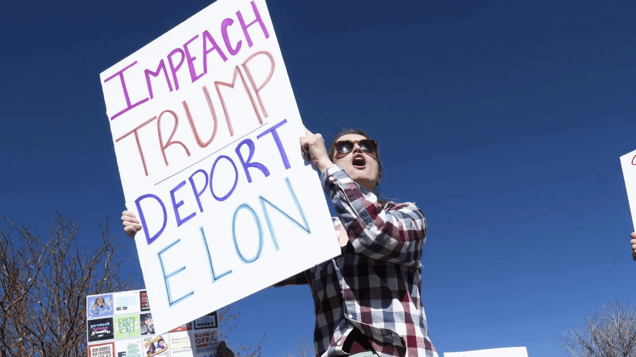 ‘Deport Elon’: Thousands protest against Trump, Musk in cities across US