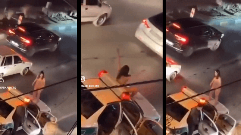 Iranian woman protests hijab laws by stripping naked and jumping on police car